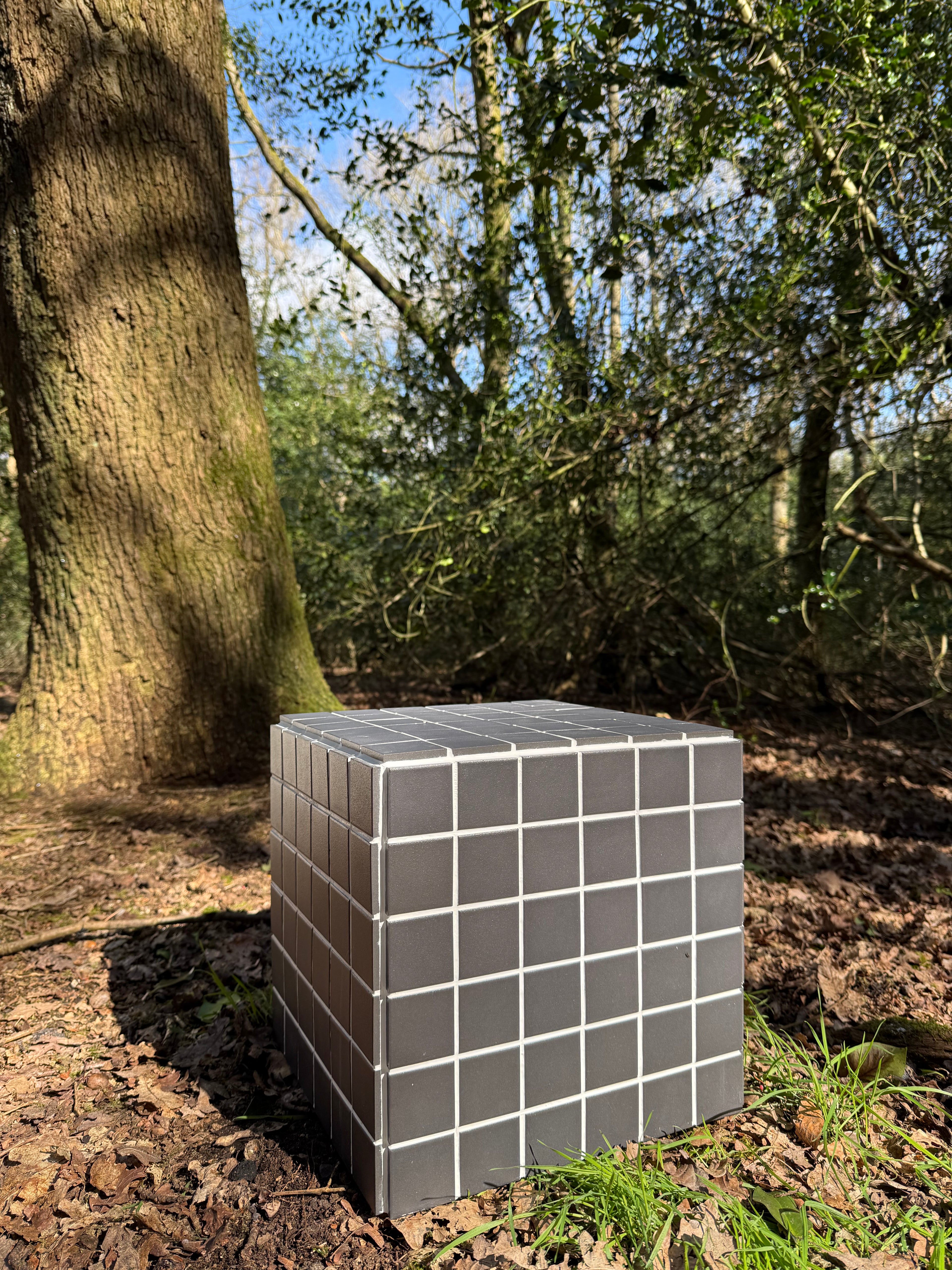 Black porcelain mosaic tile cube side table with white grout