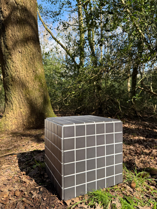 Black porcelain mosaic tile cube side table with white grout