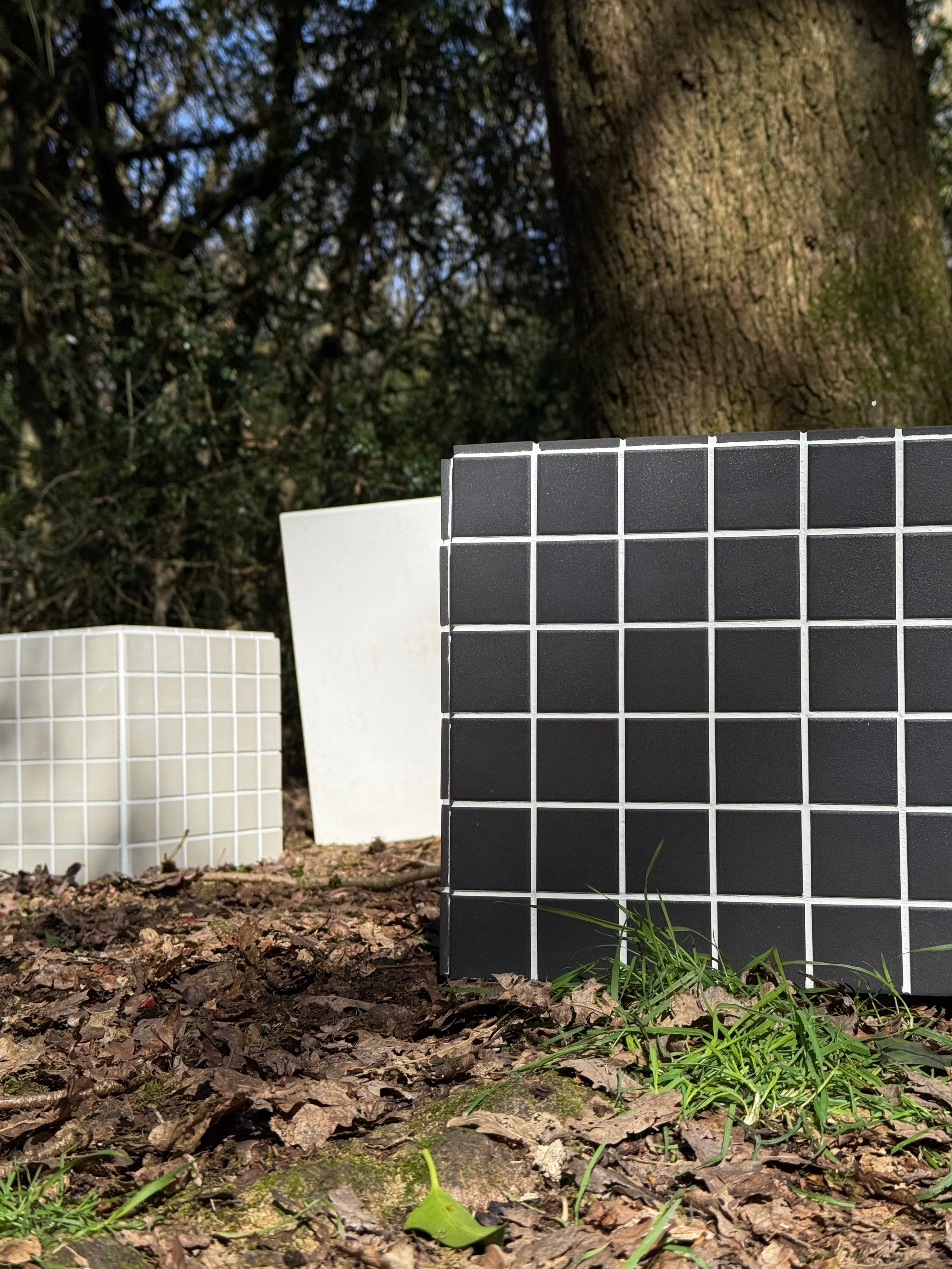 Collection of handmade porcelain tile side tables and furniture by Jack the Tiler Studio, made in the UK